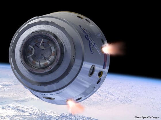 Image: Artist's illustration of Dragon space capsule in Earth orbit